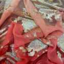 Metallic silk jacquard coral orange nude gradient on a gold chiffon background Metallic silk jacquard coral orange nude gradient on a gold chiffon background