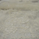 Ivory embroidered lace fabric