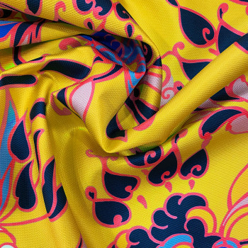 100% polyester piqué fabric with baroque flowers on a yellow background