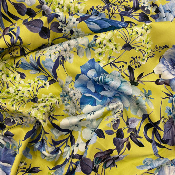 Tissu satin de coton imprimé floral bleu sur fond jaune acide