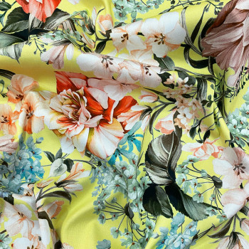 Orange floral print on pale yellow background cotton satin fabric