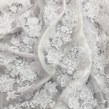 Optical white beaded embroidered tulle fabric with floral reliefs