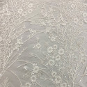 Off-white sequined embroidered tulle fabric with floral stems