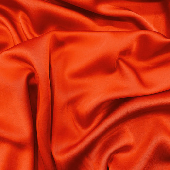 Bright orange satin-back cady crepe fabric
