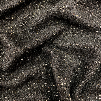 Black with gold glitter woven and iridescent fabric
