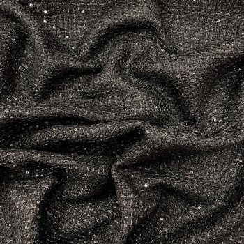 Tissu tissé et irisé noir et petites paillettes noires