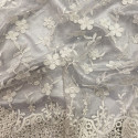 Off-white flower embroidered and sequined tulle fabric