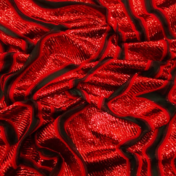 Red lamé wave silk jacquard fabric on black organza