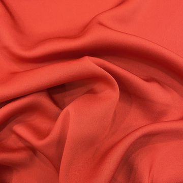 Coral red satin-back cady crepe fabric
