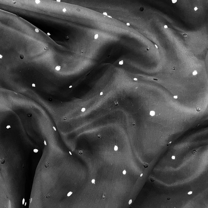 Black and white plumetis on black background silk organza fabric