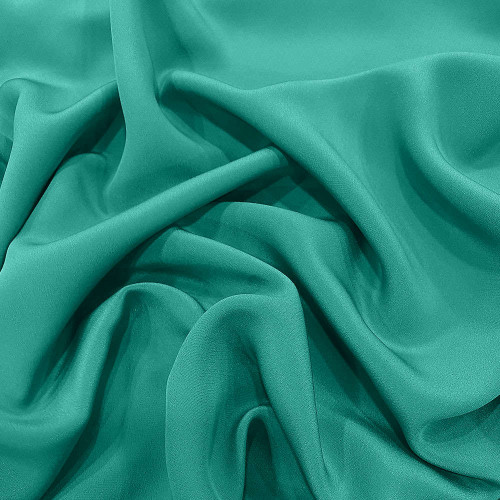 Turquoise blue 100% silk crepe fabric