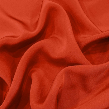Tissu crêpe drap de soie corail