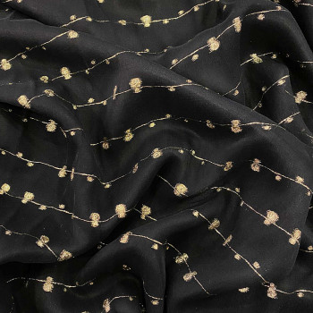Tissu jacquard de soie fil coupé bulles dorées sur voile noir