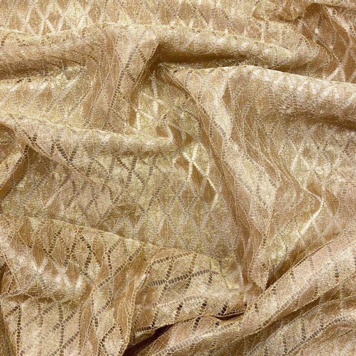 Gold diamond lace on a gold background fabric
