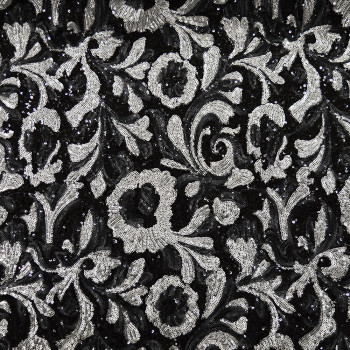 Tissu paillettes argent sur fond noir