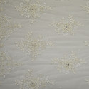Tissu tulle brodé perlé ivoire (1,90 mètres) Tissu tulle brodé perlé ivoire (1,90 mètres)