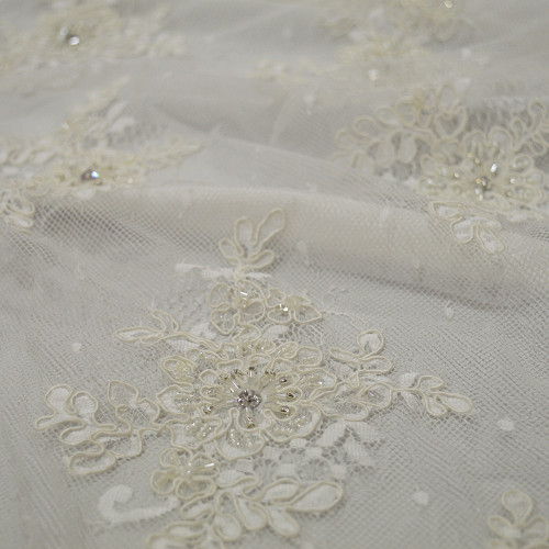 Tissu tulle brodé perlé ivoire (1,90 mètres)