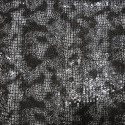 Silver sequin fabric on black crocodile print background