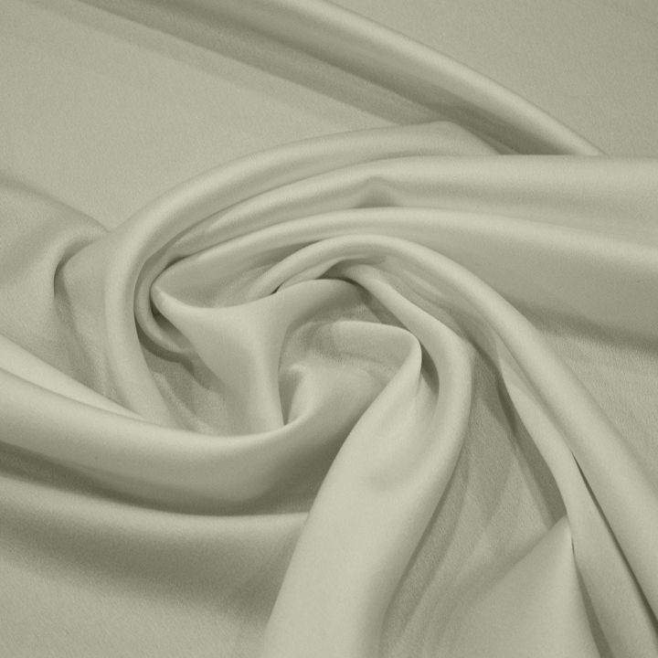 Raw white satin-back cady crepe fabric