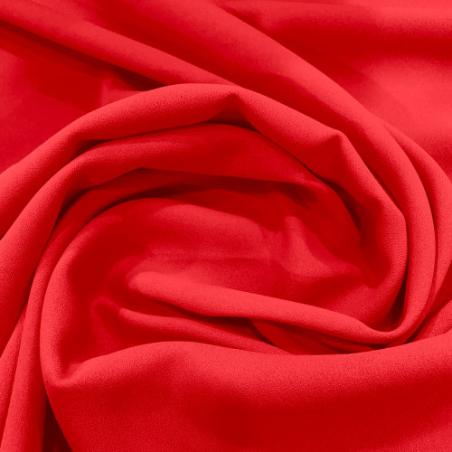 Tissu crêpe 100% polyester corail