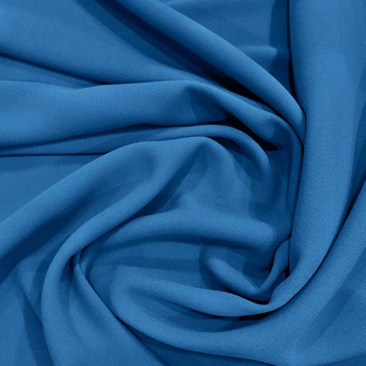 Turquoise blue 100% polyester crepe fabric