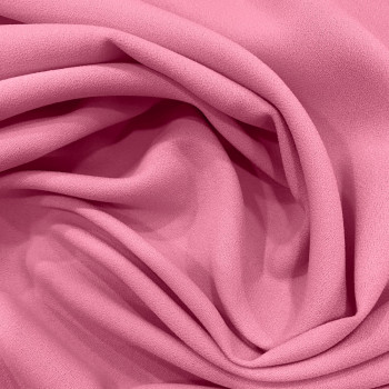 Tissu crêpe 100% polyester rose dragée