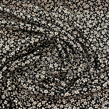 Tissu twill 100% viscose imprimé floral blanc cassé sur fond noir