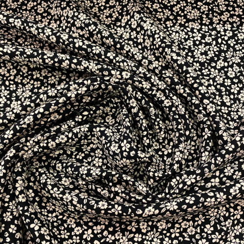 Raw white floral print on black 100% viscose twill fabric