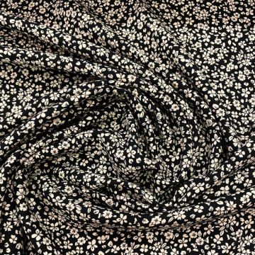 Raw white floral print on black 100% viscose twill fabric