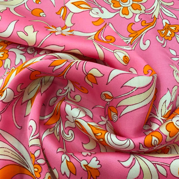 Floral print on pink 100% viscose satin fabric