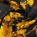Orange floral fil coupé on black silk jacquard fabric