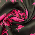 Fuchsia floral fil coupé on black silk jacquard fabric
