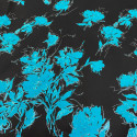 Turquoise floral fil coupé on black silk jacquard fabric Turquoise floral fil coupé on black silk jacquard fabric