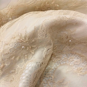 Beige beaded lace fabric