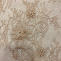 Beige beaded lace fabric Beige beaded lace fabric