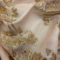 Metallic silk jacquard flowers on a gold nude muslin background (1.75 meters)