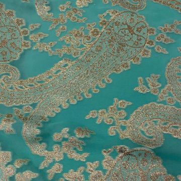 Jacquard de soie métal paisley or sur fond mousseline turquoise