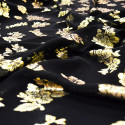 Gold metal silk jacquard fabric on black chiffon