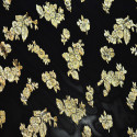 Gold metal silk jacquard fabric on black chiffon