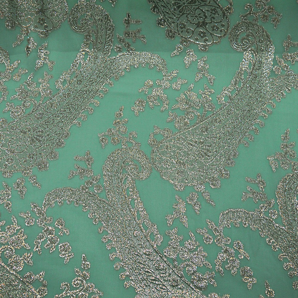 Metallic silk jacquard fabric with jade green chiffon background