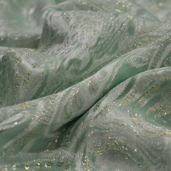 Gold metal silk jacquard fabric on Nile green chiffon