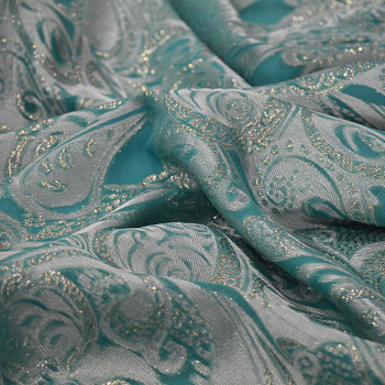 Gold metal silk jacquard fabric on jade green chiffon