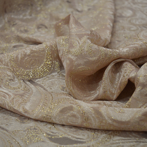 Gold metal silk jacquard fabric on nude chiffon