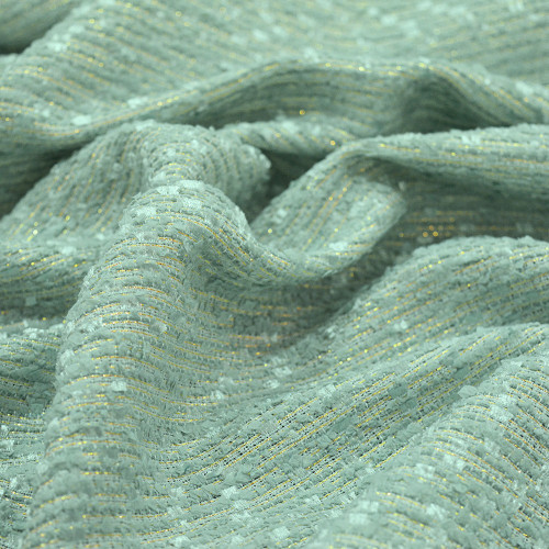 Iridescent woven tweed fabric almond green