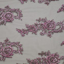 Pink beaded and embroidered tulle fabric