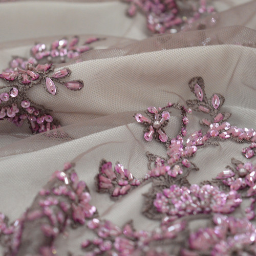 Pink beaded and embroidered tulle fabric