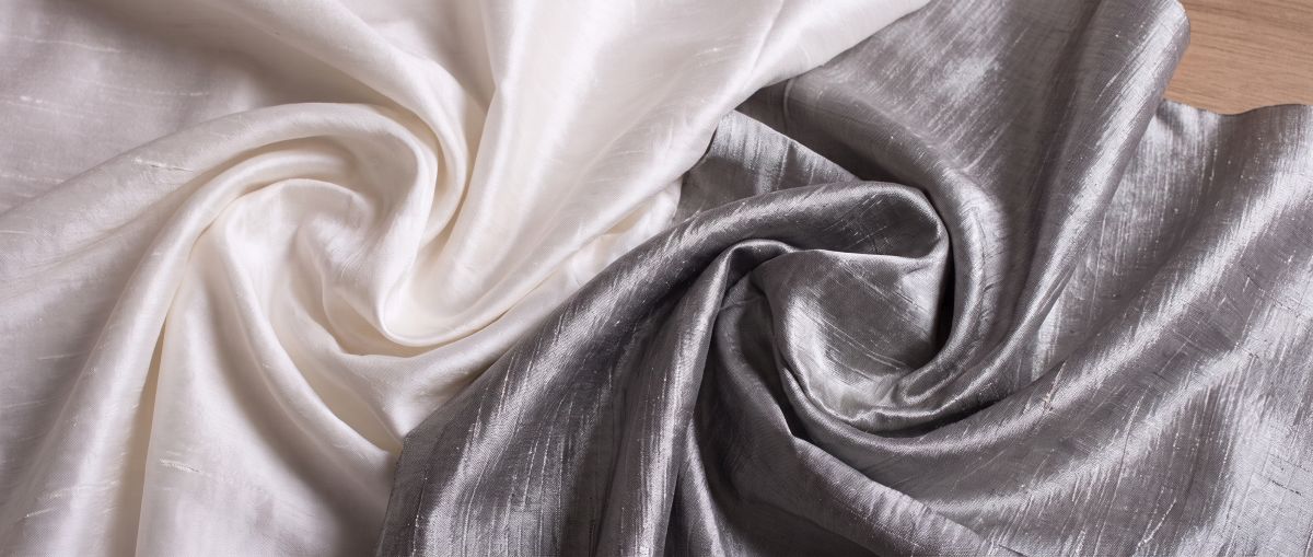Two lengths of silk dupion side by side